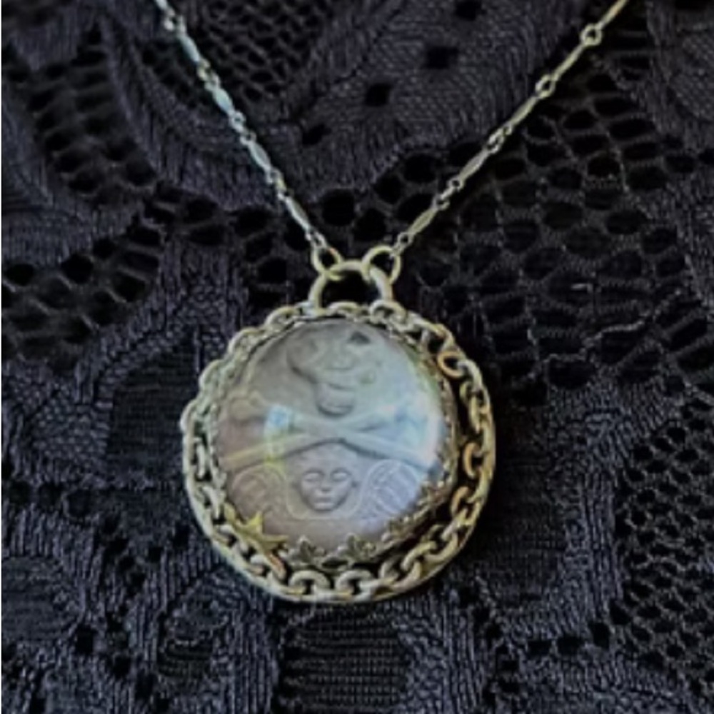 Sterling silver memento mori necklace